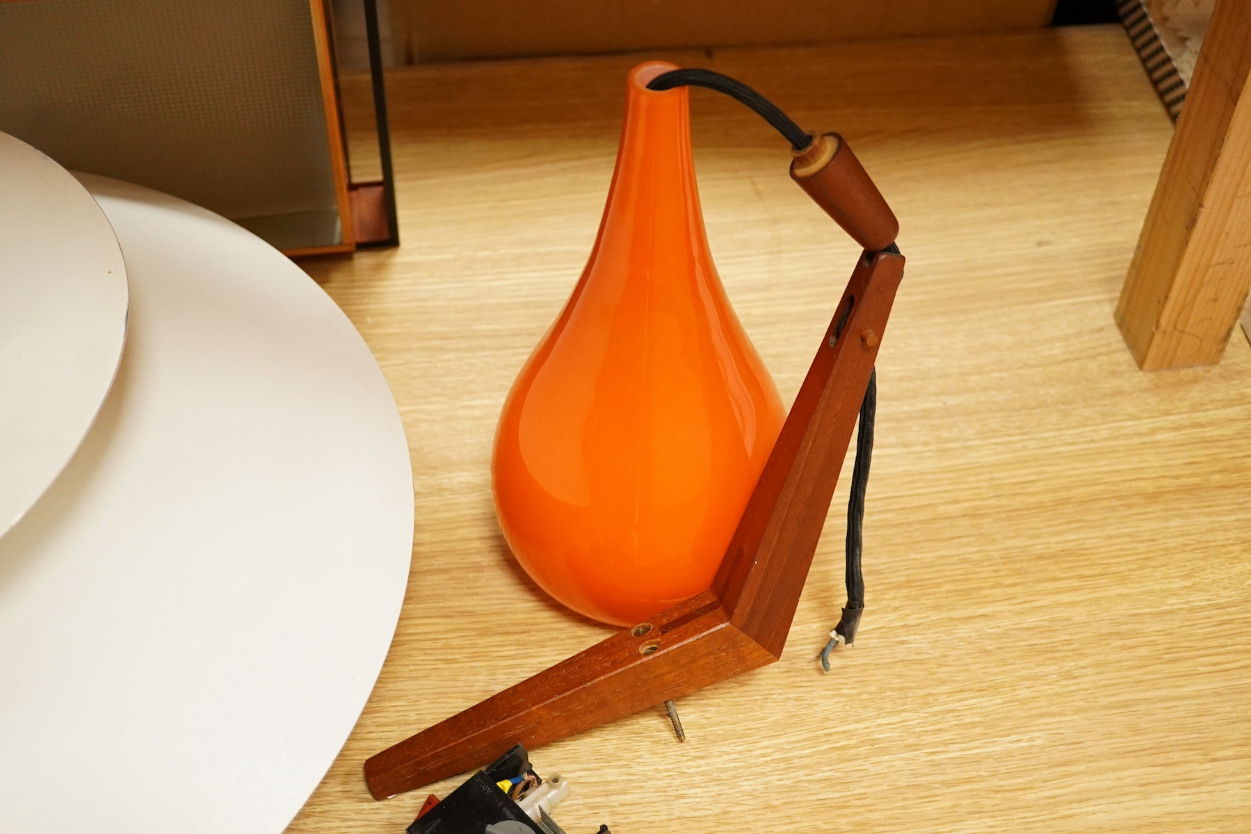 A 1970’s Poul Henningsen PH5 Danish tiered cream and blue enamelled pendant ceiling light and a large rectangular shaped sheet metal ceiling light, together with a pair of Holmegaard teak and orange glass pendant wall li